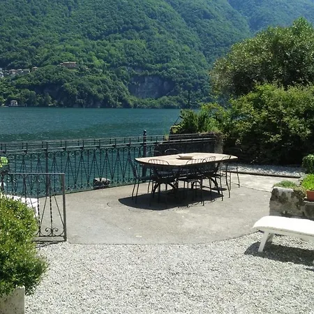 Apartment House On The Shore Of *