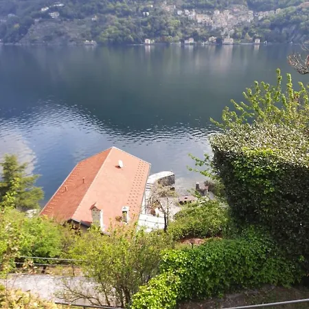 Apartment House On The Shore Of